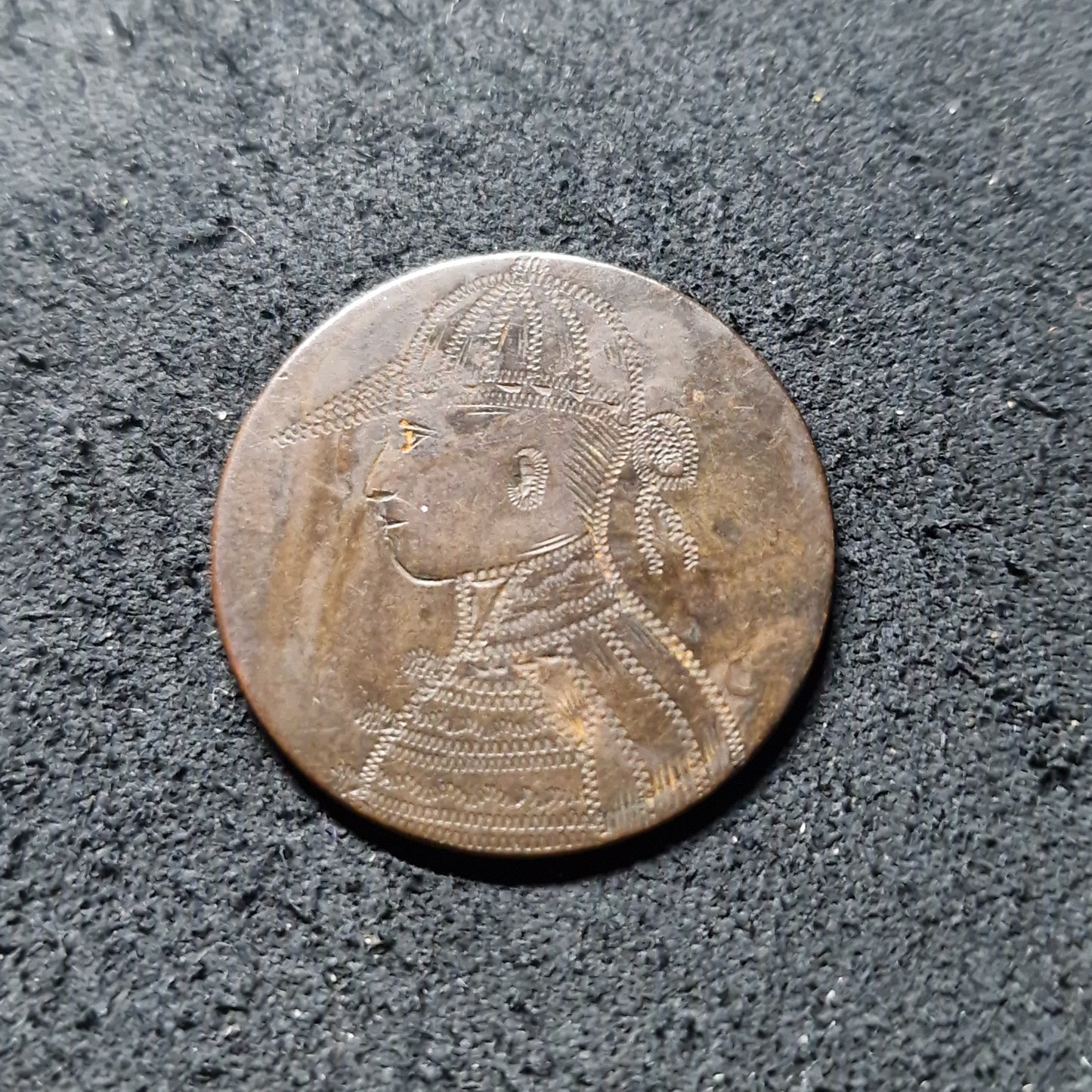 Queen Victoria, bun penny 1863 - Victoria re-engraved as a jockey.